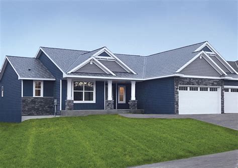 blue house with white metal roof|houses with blue shingle roofs.